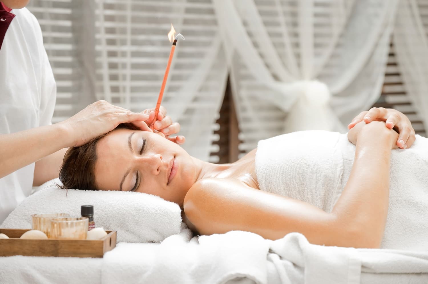 What is ear candling?
